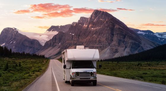 rv driving down the road. 