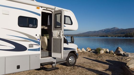 camper parked near lake