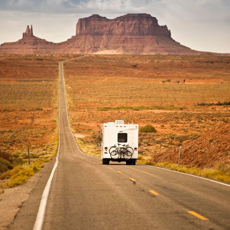 rv driving on scenic open road