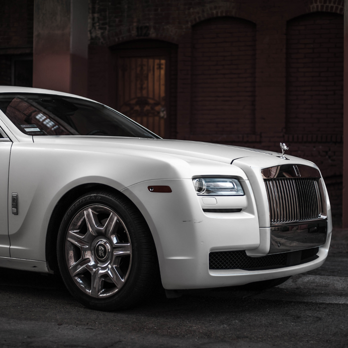 White Rolls Royce.