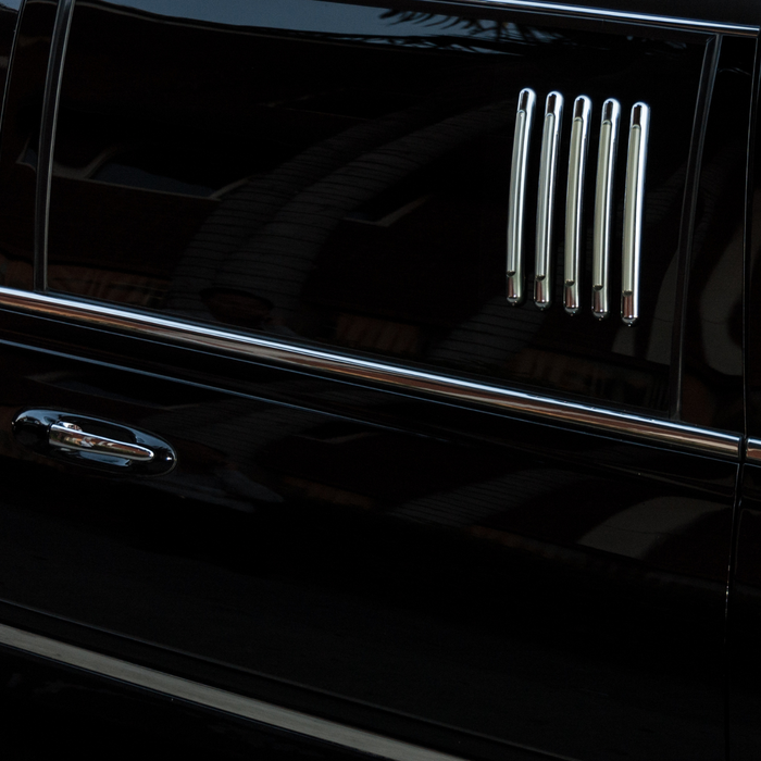 Close-up of a black limo. 