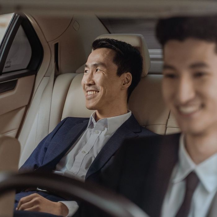 Happy man using a limo service