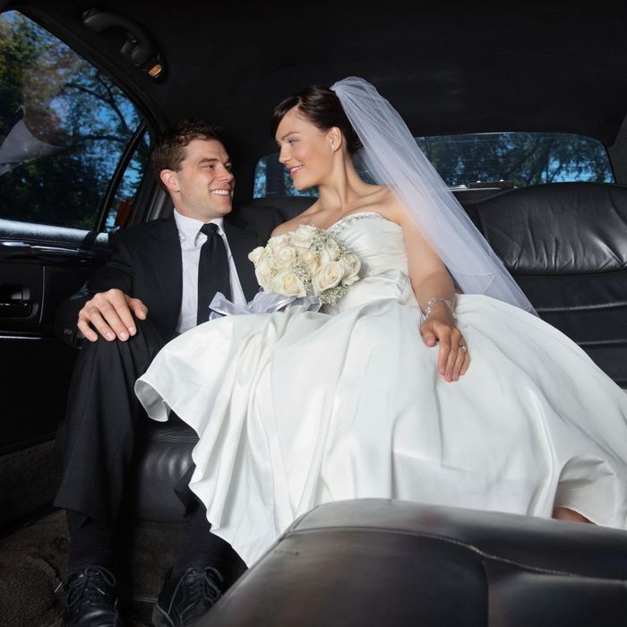 couple in limo after getting married
