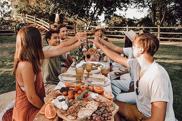 Friends having a luxury picnic