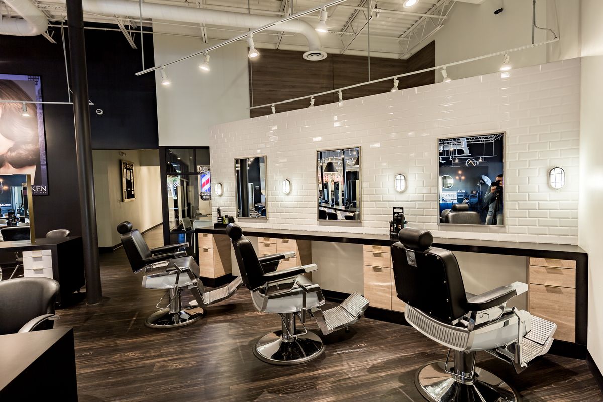 Barber student cutting hair at Summit Salon Academy Tampa