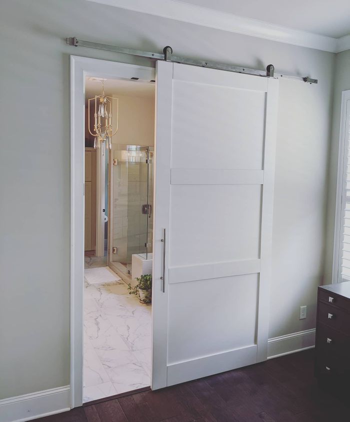 White sliding bathroom barn door from You’re Unique.