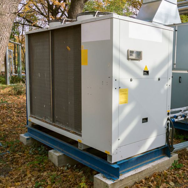 A large commercial air conditioning unit outside.