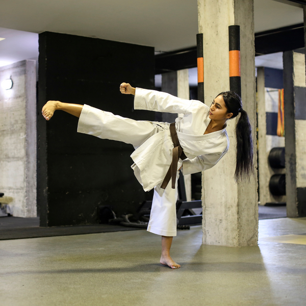 Young girl doing martial arts. 