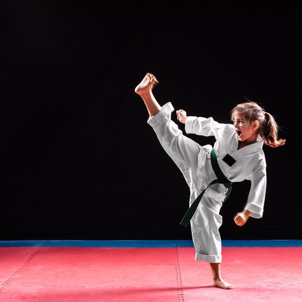 young girl doing karate 