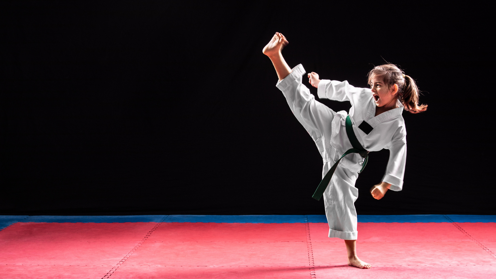 young girl doing martial arts. 