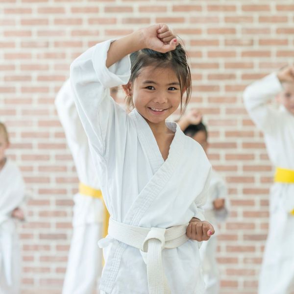 happy girl in martial arts 