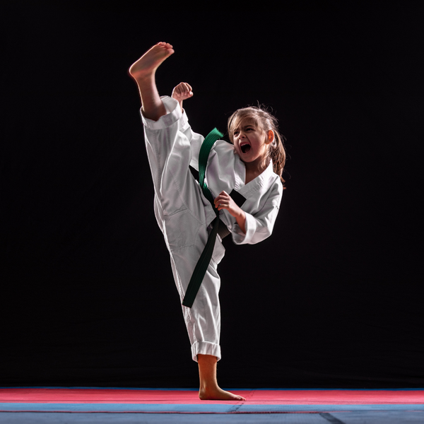 young girl doing martial arts. 