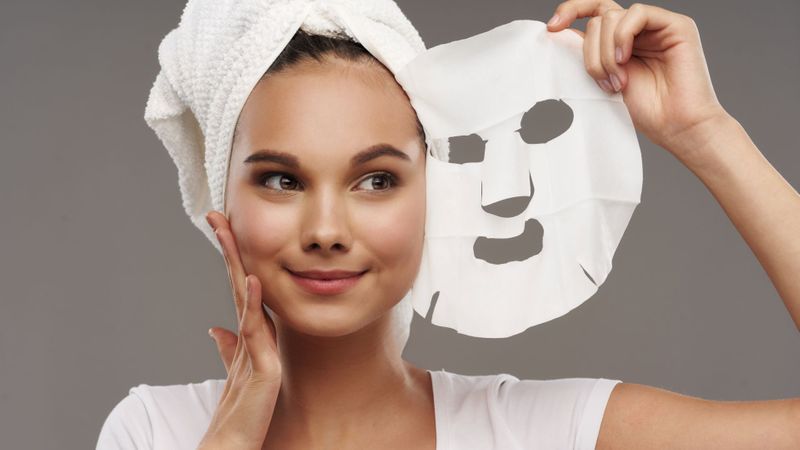woman with a skin care mask