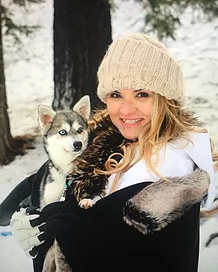 Desarie holding a klee kai puppy from Kika's Klee Kai