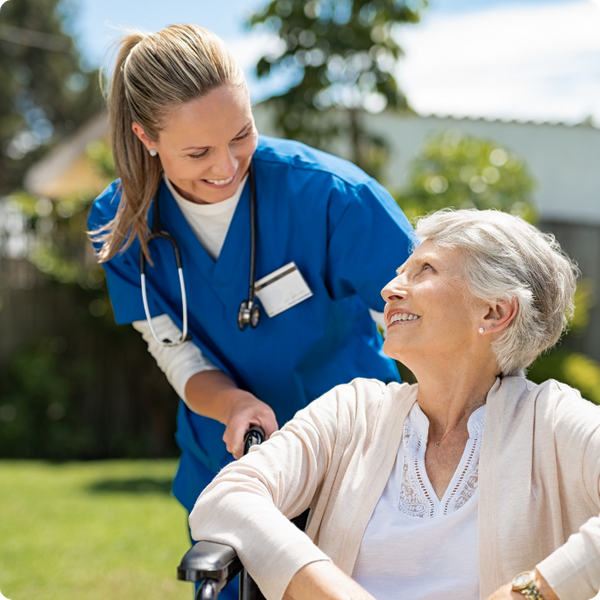 elderly woman with care taker