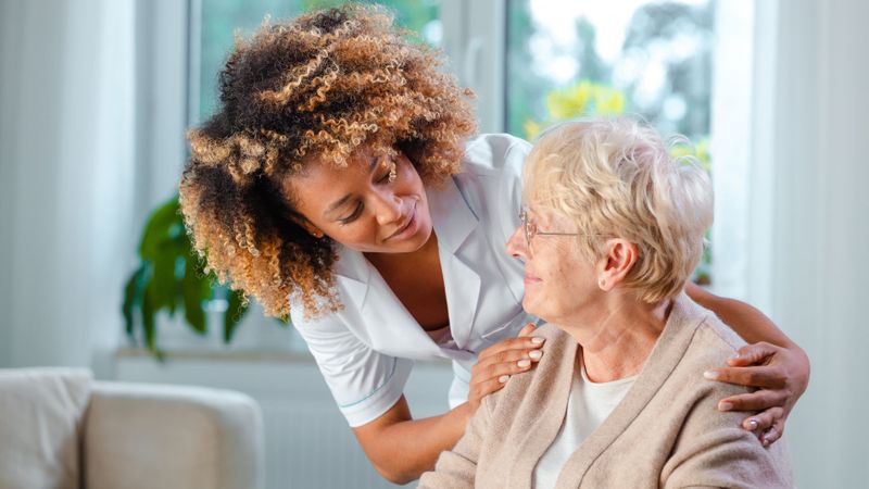 caregiver tending to senior