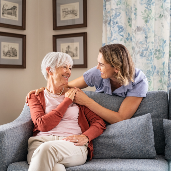 caregiver and senior smiling