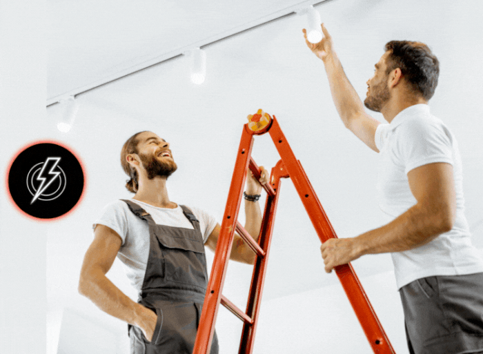 team of electricians installing lighting in a home