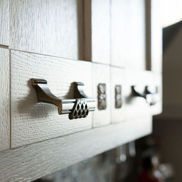 close up view of handles on cabinet