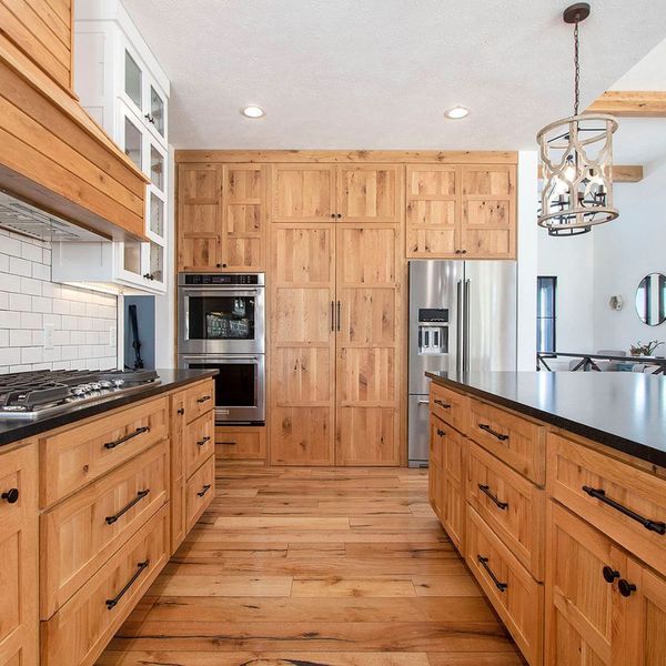kitchen with traditional wood cabinets and flooring
