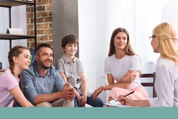 family talking with therapist