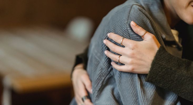 two people hugging two people hugging