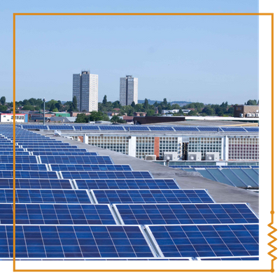 commercial solar panels, high-rises in background