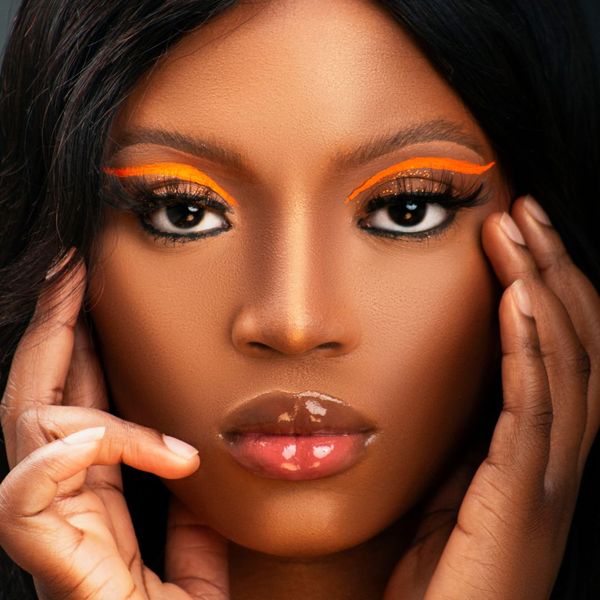a woman with elaborate makeup How to Care for Your Eyelash Extensions (3).jpg
