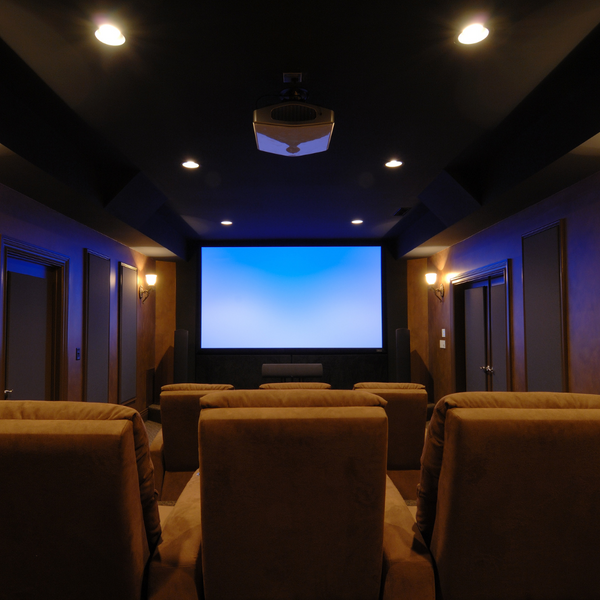 home theater with rows of recliners