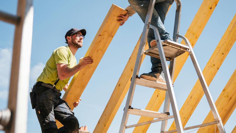 contractors building a roof