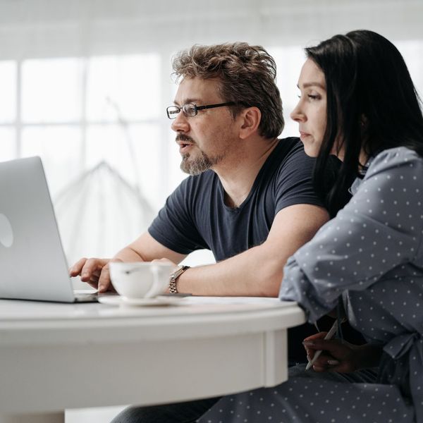 couple looking at computer couple looking at computer