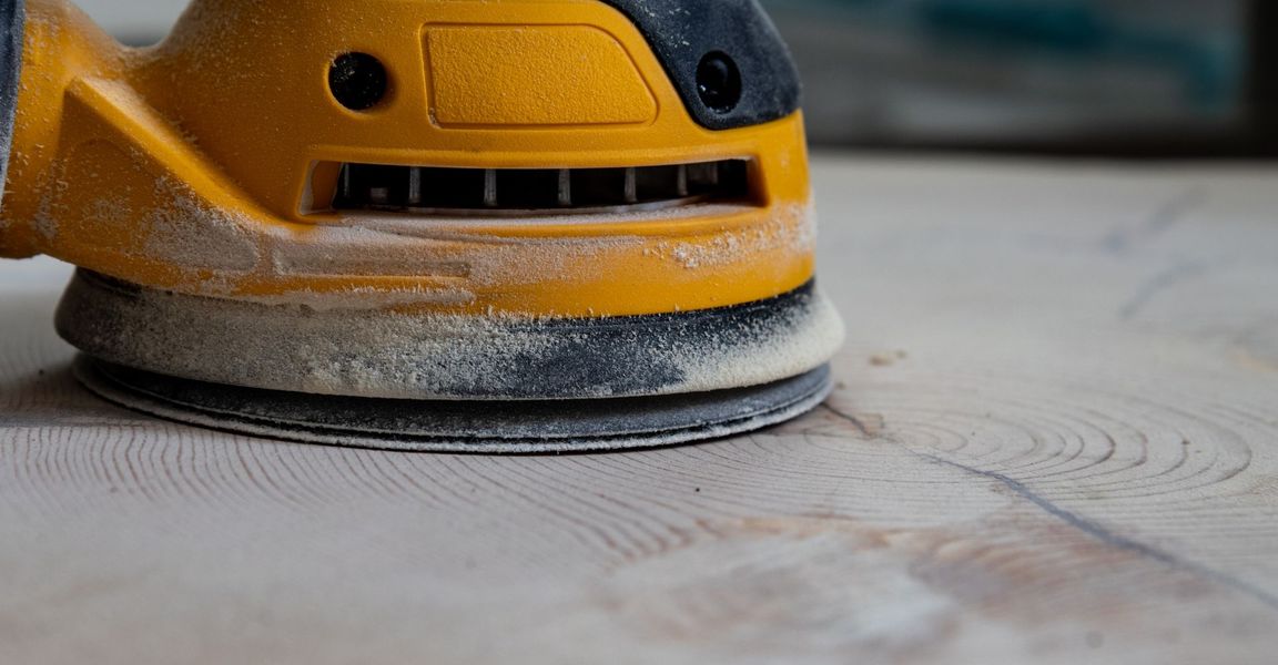 Close up of a dusty sander