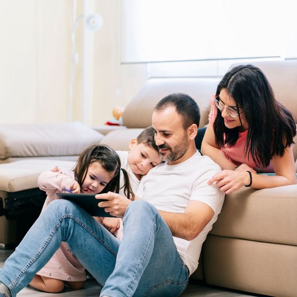 family sitting on a couch