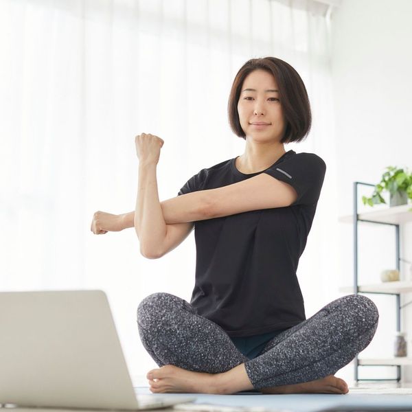 woman working out in a spare bedroom