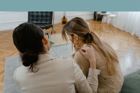 doctor talking to woman
