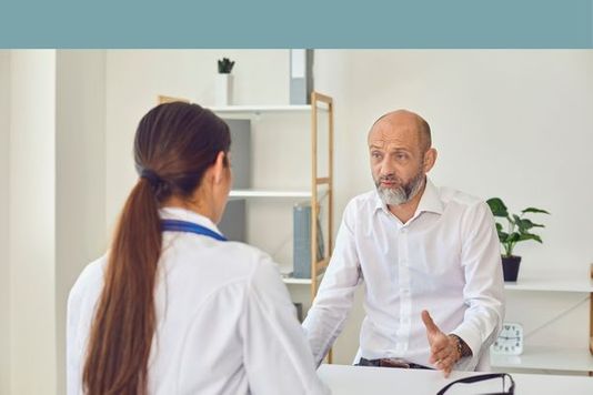 doctor talking to patient