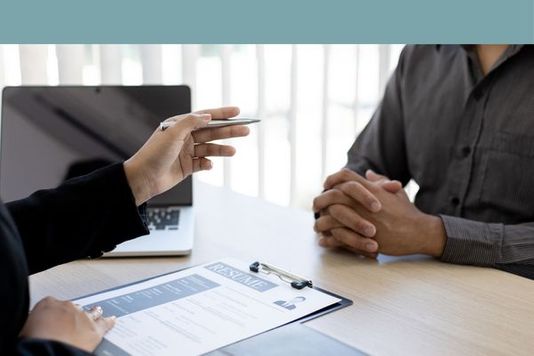 employer and employee talking