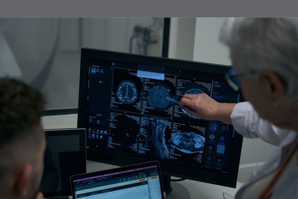 doctors evaluating neurology scan