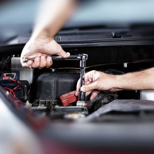 Mechanic working on a car