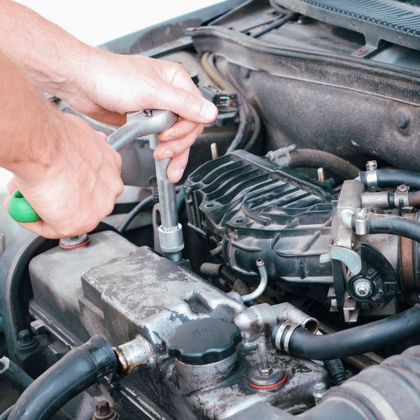 mechanic working on car 