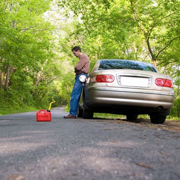 man stuck on the side of road