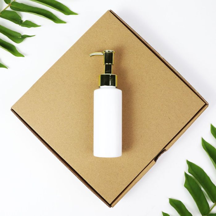 lotion bottle on a box