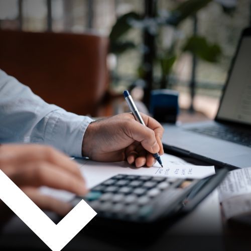 A Person Using a Calculator