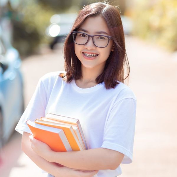 teenager smiling with braces