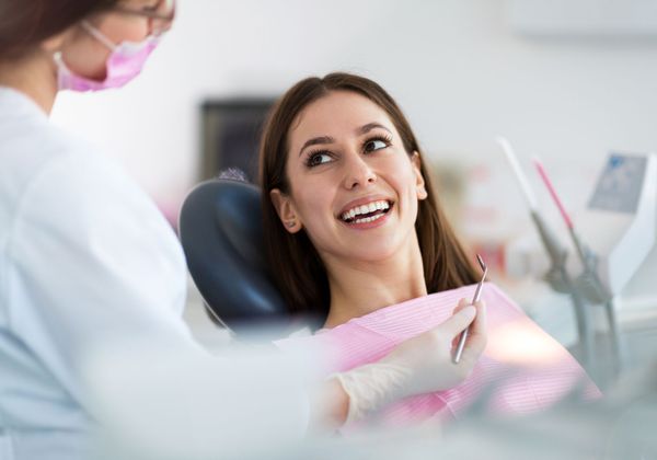 woman smiling in dental chair