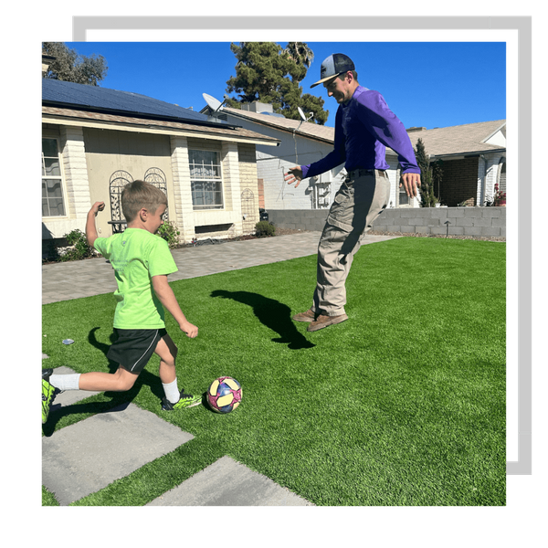 family playing in backyard