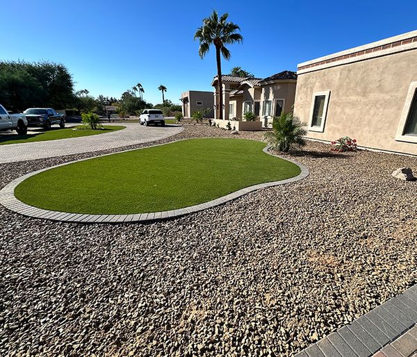 Image of grass with a concrete border