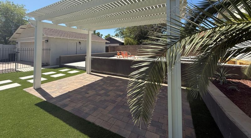 a white pergola Why You Shouldnt Wait to Add Shade Hero.jpg