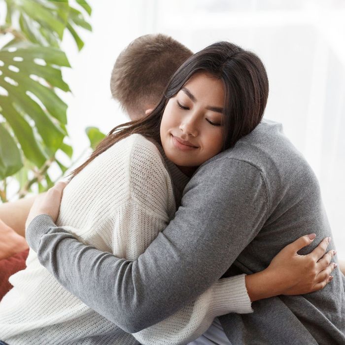 couple hugging during therapy session
