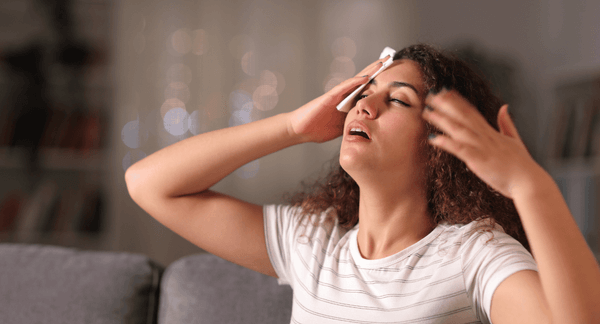 woman sweating needs new ac larger LTS.png